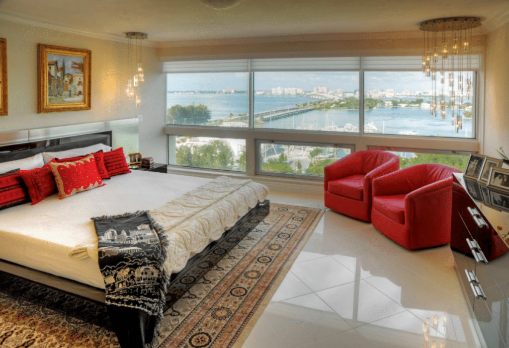 Bedroom in a senior residence with a view of the water in Plymouth Harbor on Sarasota Bay