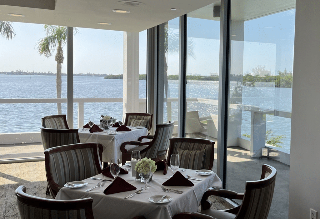 Dining room at Plymouth Harbor on Sarasota Bay with a view of the water