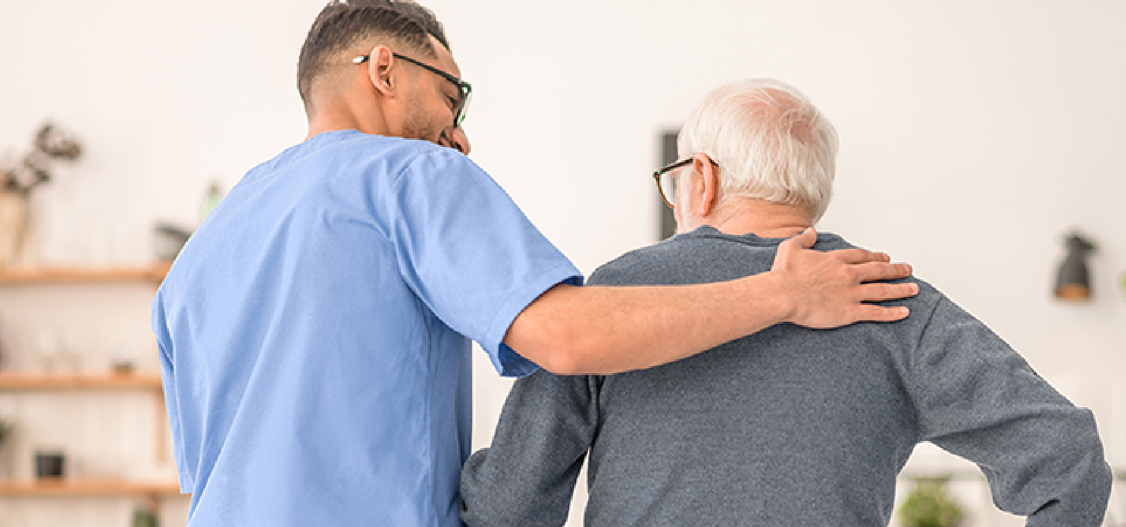 Plymouth Harbor on Sarasota Bay: Senior Man Walking with Caregiver