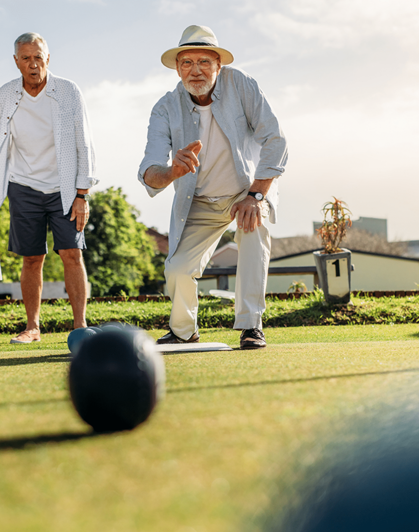 Senior men playing bocce ball