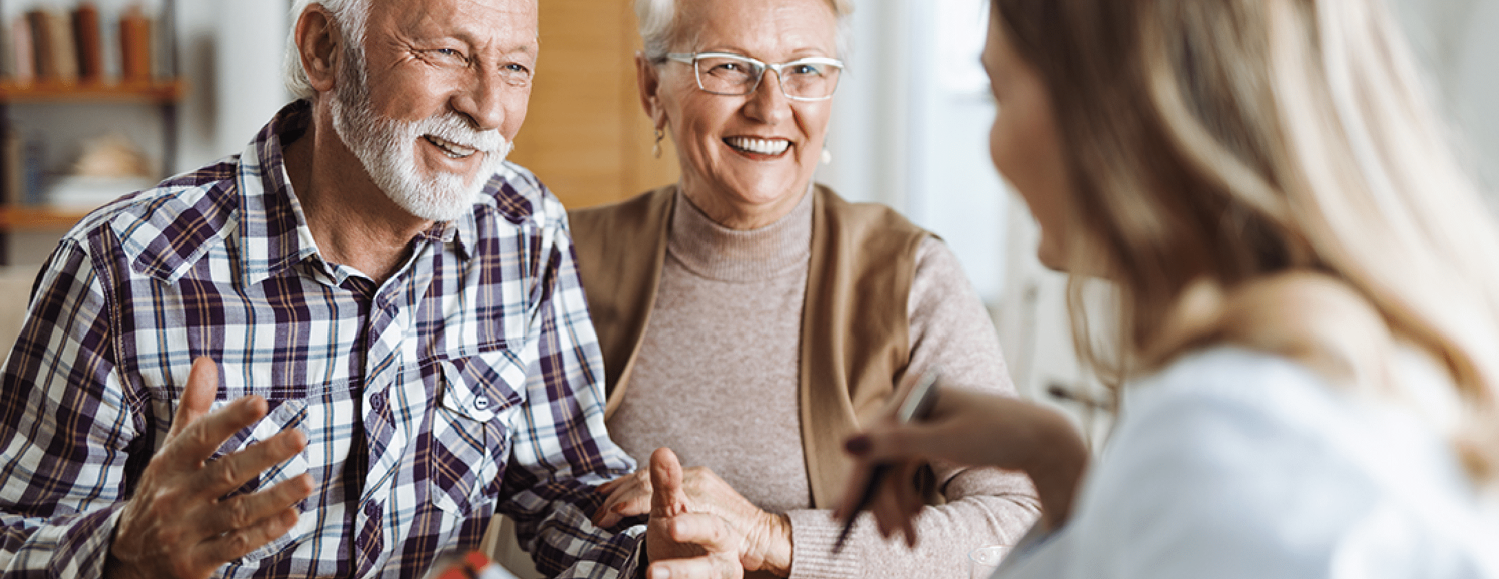 Plymouth Harbor on Sarasota Bay: Senior Couple Talking with Caregiver