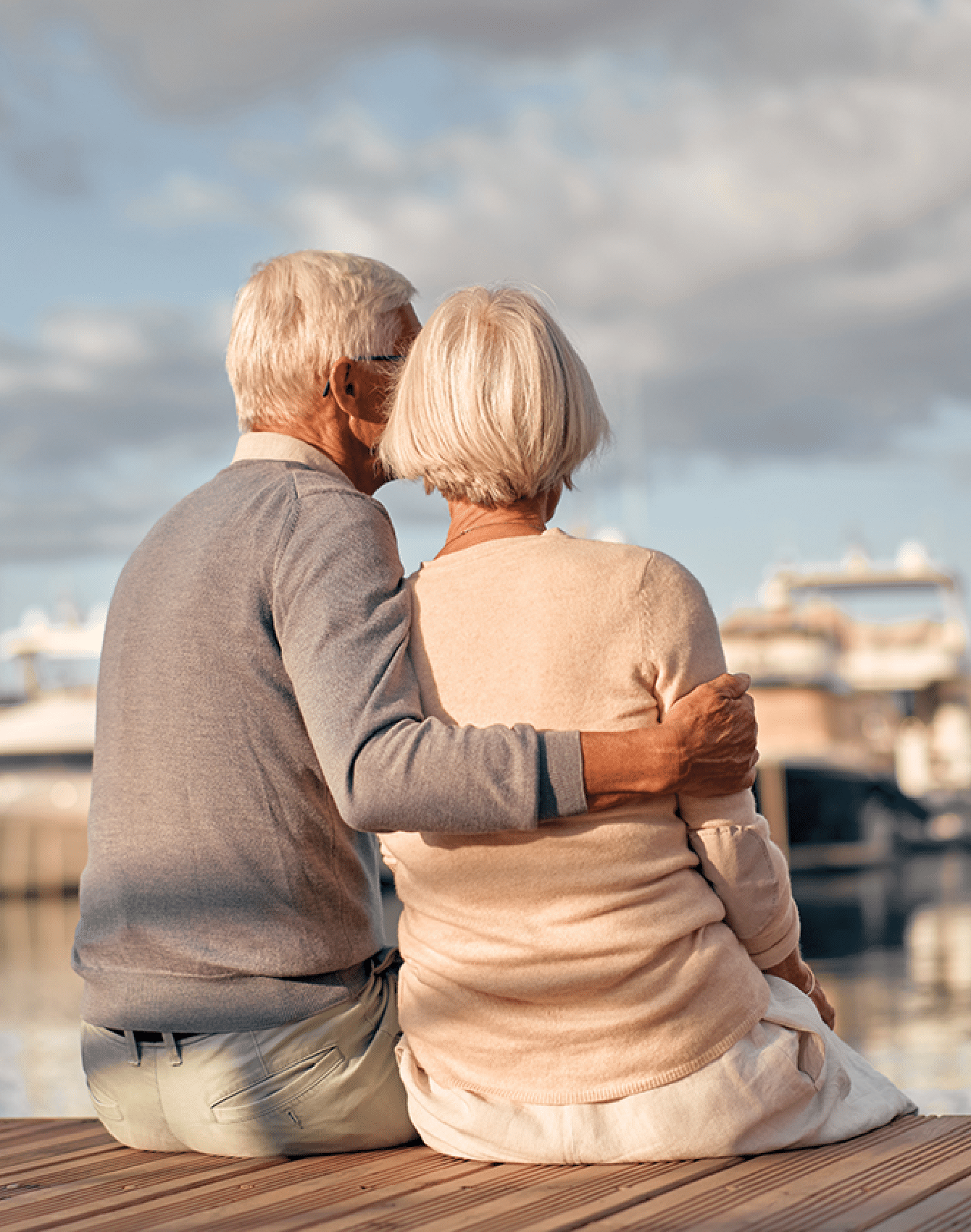 Plymouth Harbor on Sarasota Bay: Senior Couple Sitting Outside on Dock Together