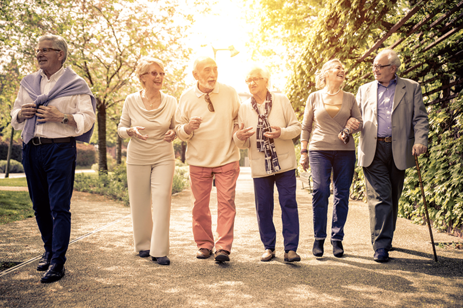 Plymouth Harbor on Sarasota Bay: Senior Men and Women Walking on a Path Outside