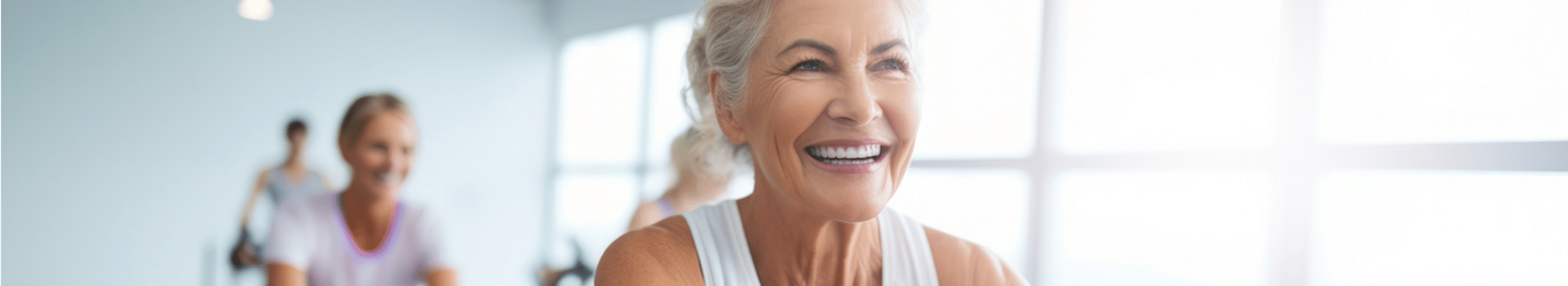 Plymouth Harbor on Sarasota Bay: Senior Woman Riding Stationary Bike